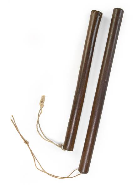 Appraisal: A pair of Hawaiian kauila wood hula sticks ka la'au