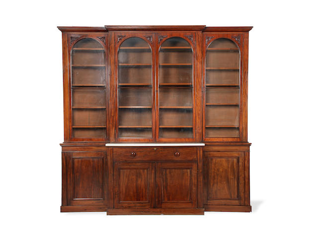 Appraisal: A Victorian mahogany breakfront secretaire bookcase the moulded cornice over