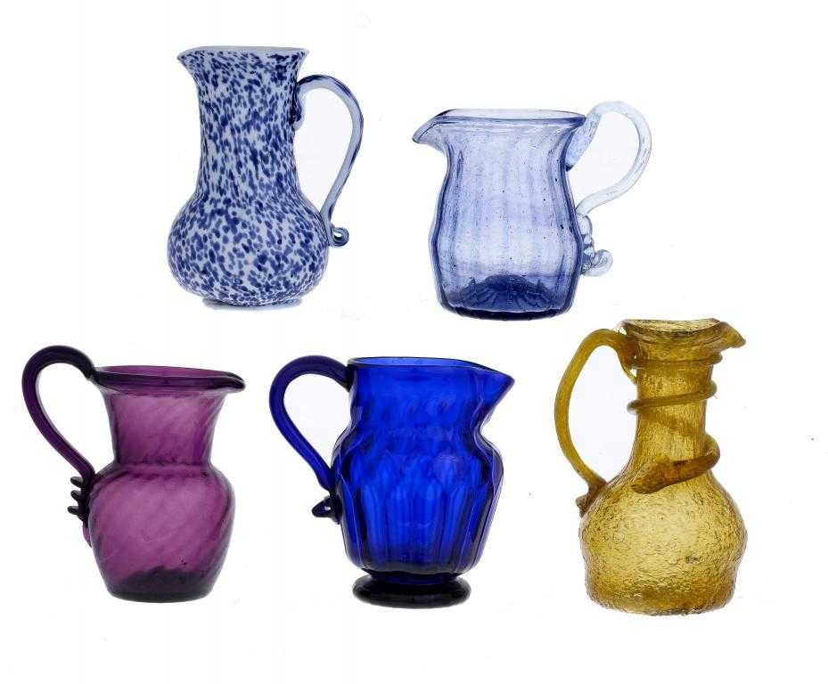 Appraisal: AN ENGLISH MOULD-BLOWN BLUE GLASS JUG A WRYTHEN FLUTED AMETHYST