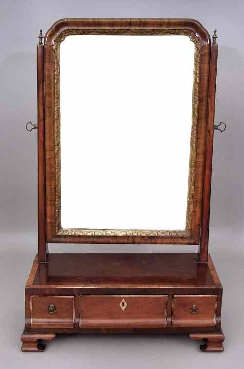 Appraisal: A George III mahogany rectangular toilet mirror with arched top