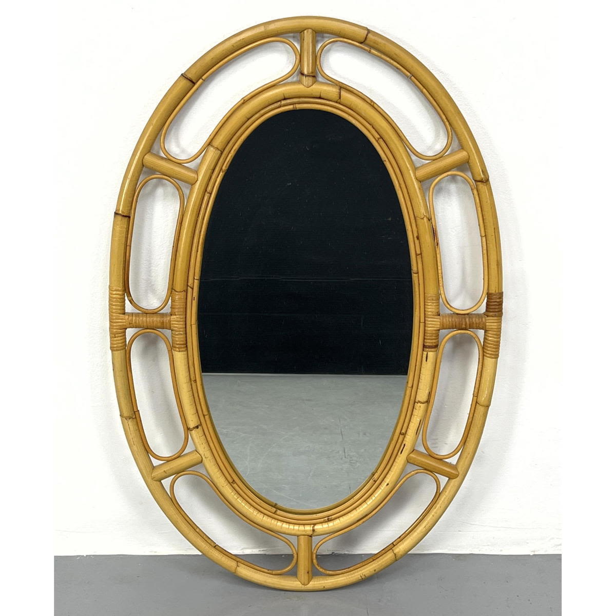 Appraisal: Oval Wrapped Rattan Framed Wall Mirror Dimensions H inches W