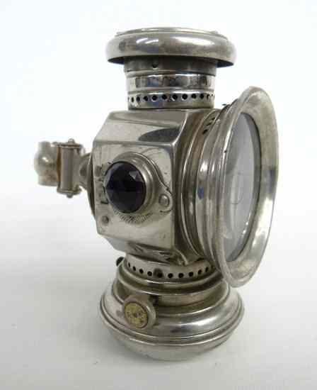 Appraisal: Matthews and Willard oil head lamp with bracket