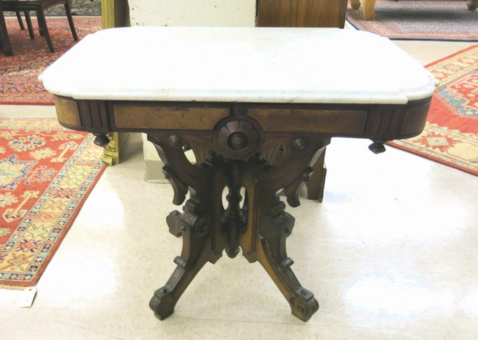 Appraisal: VICTORIAN MARBLE-TOP WALNUT LAMP TABLE Renaissance Revival design American c