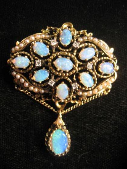 Appraisal: Opal pearl and diamond chatelaine brooch Ten oval cabochon white