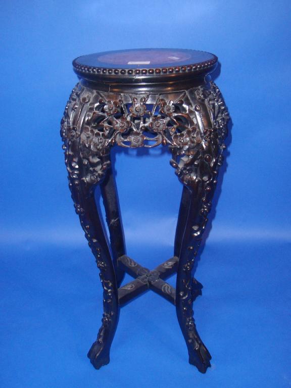 Appraisal: A Chinese rosewood jardiniere stand with marble inset circular top