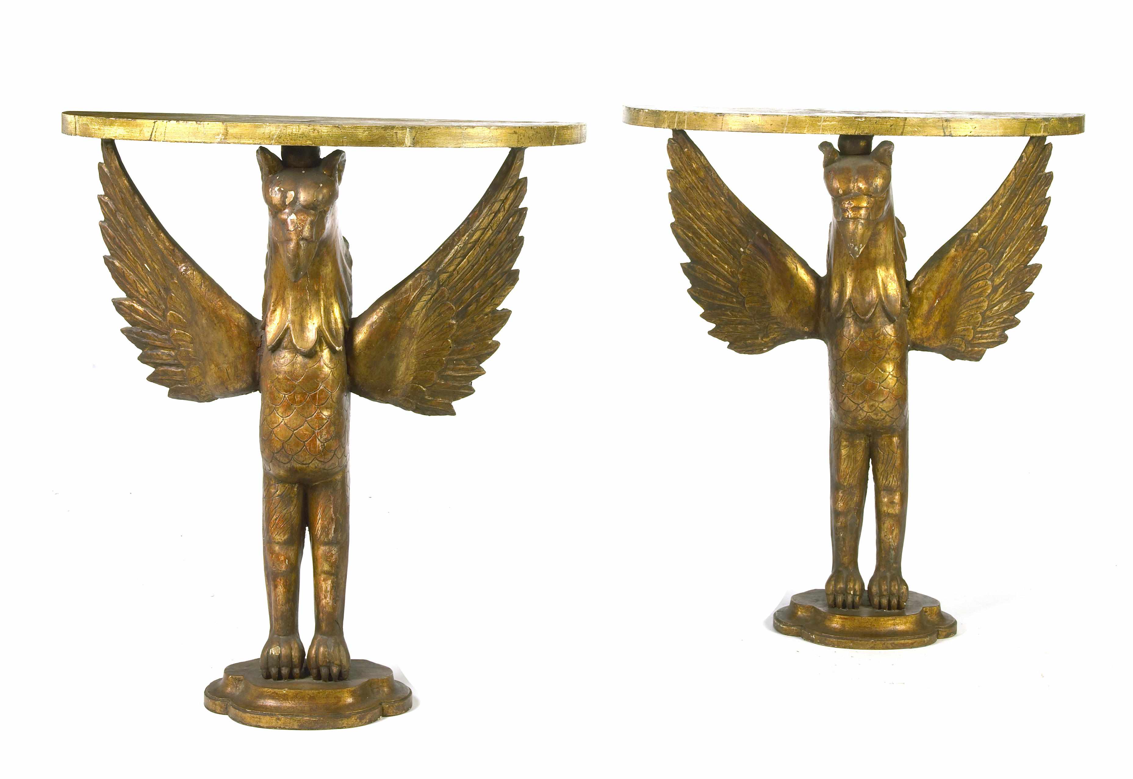 Appraisal: A pair of giltwood console tables in the form of