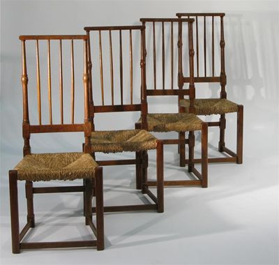 Appraisal: Four rush seated oak chairs turned back splats two stamped