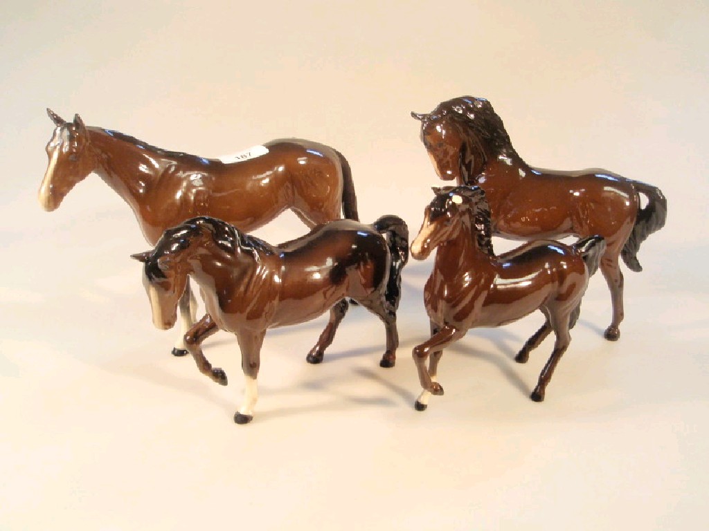 Appraisal: Three Royal Doulton horses and a foal