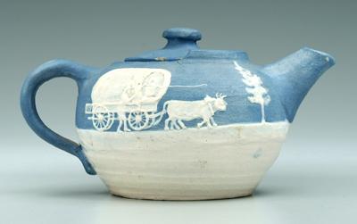 Appraisal: Steven cameo teapot cameo decoration over matte blue ground lower