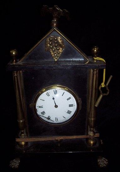 Appraisal: An early th Century Sedan chair clock the white enamel