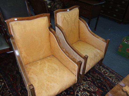 Appraisal: A pair of yellow upholstered armchairs