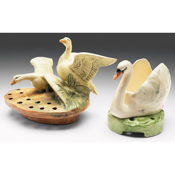 Appraisal: Weller Muskota and Brighton flower frogs two swans both marked