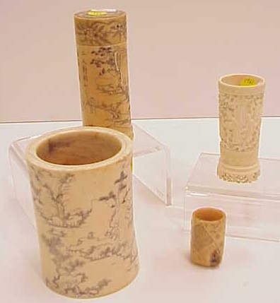 Appraisal: Bone carved covered cylindrical jar h a carved ivory brush