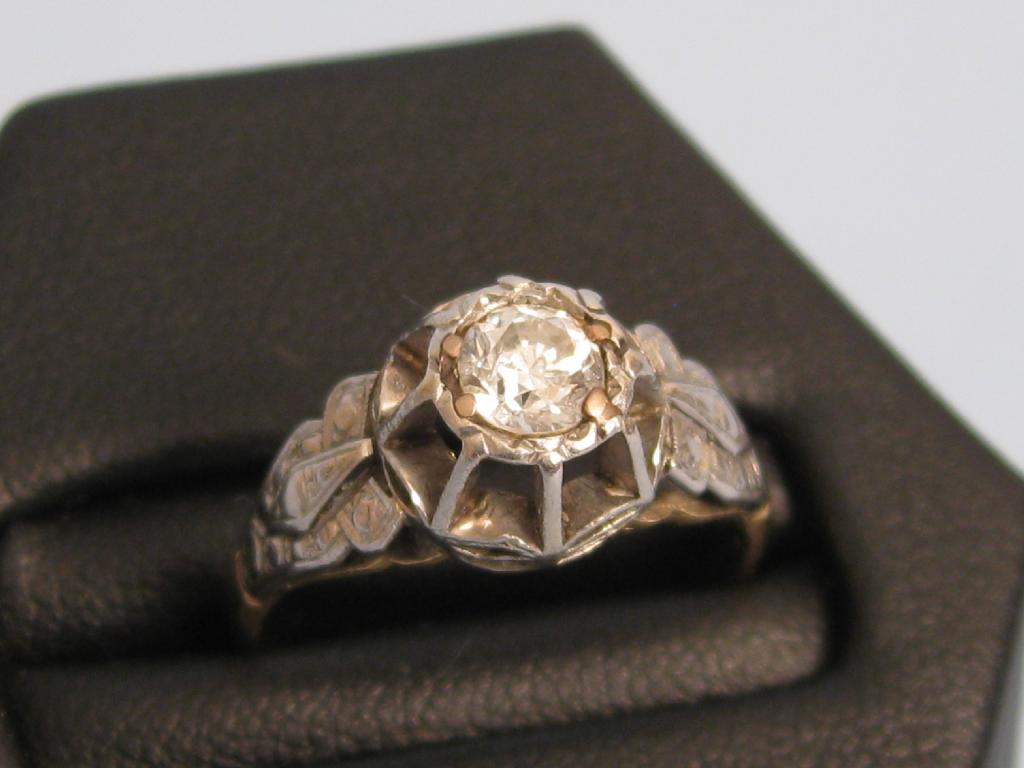 Appraisal: An Art Deco style single stone Diamond Ring the circular-cut