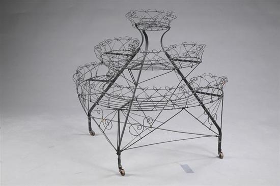 Appraisal: VICTORIAN WIRE PLANTER Black painted planter with three tiered shelves