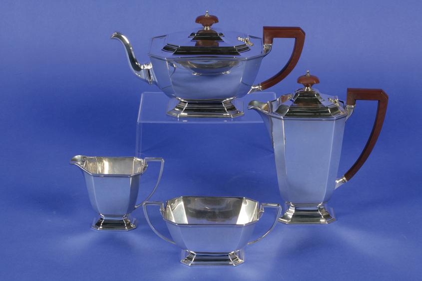 Appraisal: AN ART DECO FOUR PIECE TEA COFFEE SET of octagonal