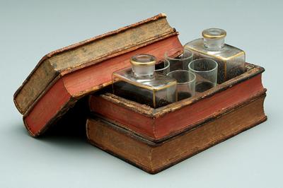 Appraisal: Book decanter set case made from four books interior with