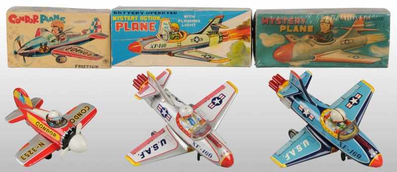 Appraisal: Lot of Tin Airplane Friction Toys Description Japanese Working Includes