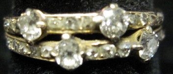 Appraisal: Yellow gold and diamond ringSet with four Old Mine cut