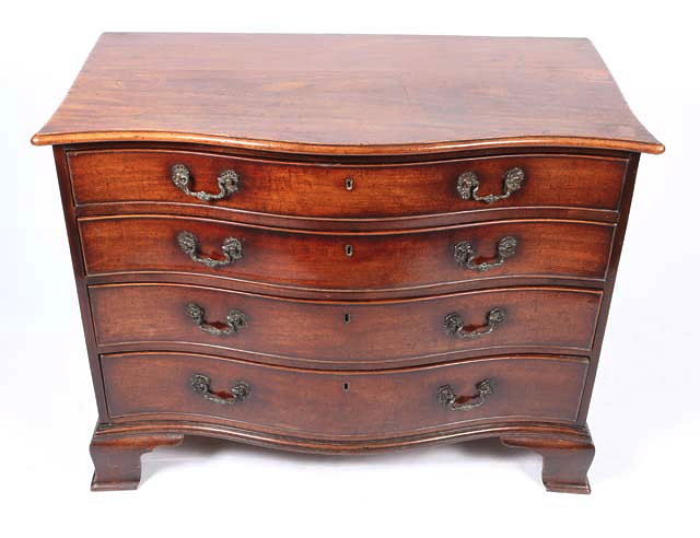 Appraisal: A GEORGE III MAHOGANY SERPENTINE FRONTED BATCHELOR'S DRESSING CHEST of