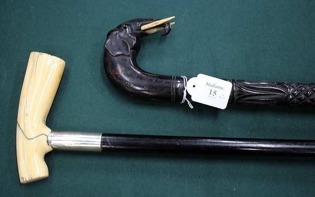 Appraisal: A TH CENTURY GENTLEMAN'S WALKING STICK the ivorine handle with