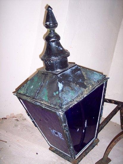 Appraisal: A police station lantern the blue glass panel sides on