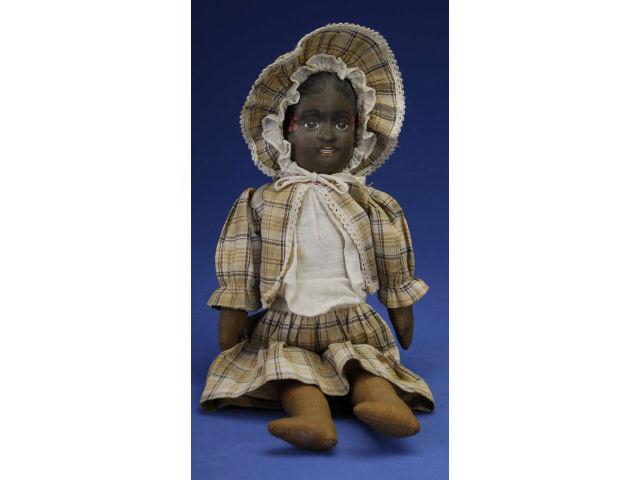 Appraisal: Bruckner Black Doll America early th century all cloth pressed