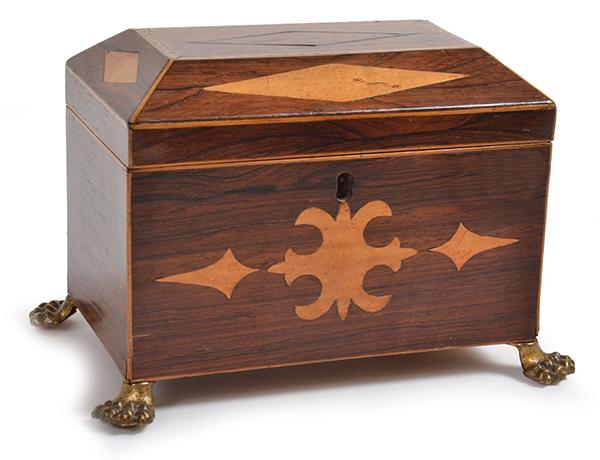 Appraisal: A VICTORIAN ROSEWOOD TEA CADDY sarcophagus shaped the lid inlaid