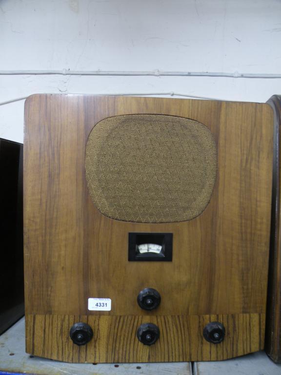 Appraisal: A s walnut radio with bakelite fittings