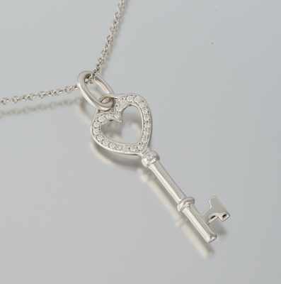 Appraisal: A Tiffany Co k and Diamond Key Pendant on Platinum