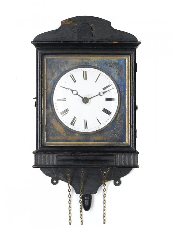 Appraisal: A BLACK FOREST EBONISED WALL HANGING CUCKOO CLOCK the enamelled