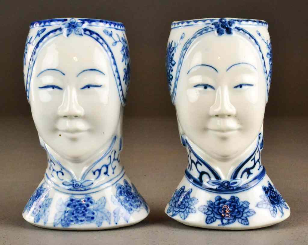 Appraisal: Pr Japanese Porcelain Wall VasesFinely moulded to depict ladies unmarked