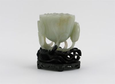 Appraisal: A Chinese pale celadon jade carving of a lotus pod