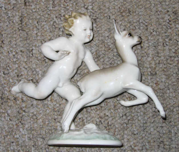 Appraisal: K TUTTER FOR HUTSCHENREUTHER GERMANY Porcelain figure group of child