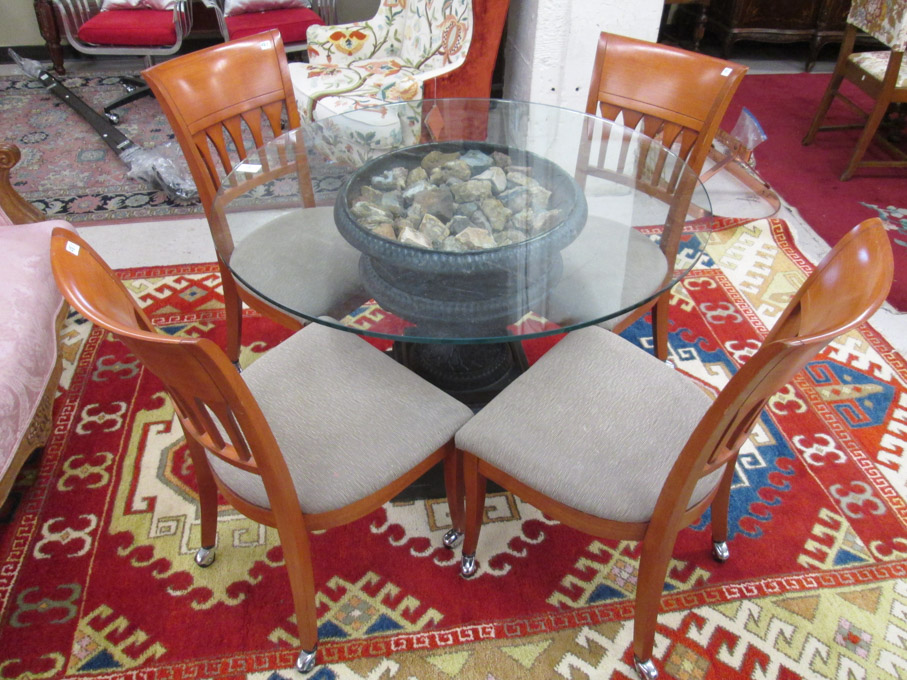 Appraisal: FIVE-PIECE DINETTE TABLE AND CHAIR SET round glass-top table with