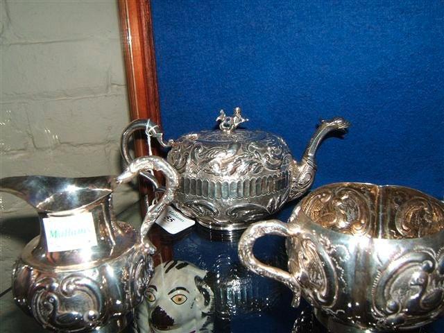 Appraisal: An Oriental coloured silver coloured metal tea pot with matching