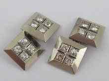 Appraisal: A pair of white metal tests carat gold diamond cufflinks