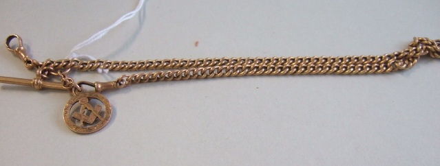 Appraisal: A gentleman's gold curb link watch Albert chain with a