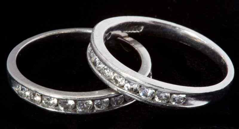 Appraisal: Two Platinum and Diamond Bandseach band with full cut round