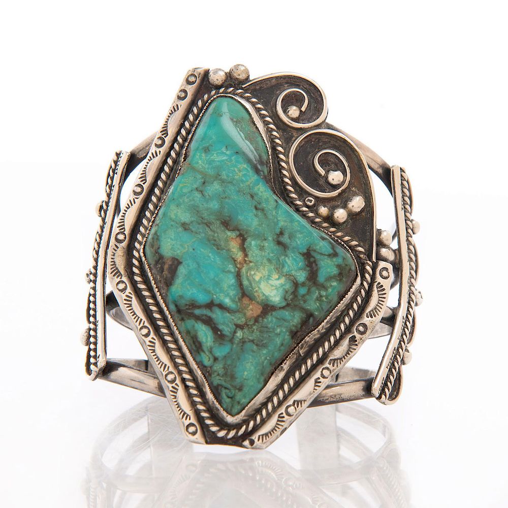 Appraisal: NAVAJO SILVER BRACELET WITH LARGE INSET TURQUOISE Cuff bracelet with