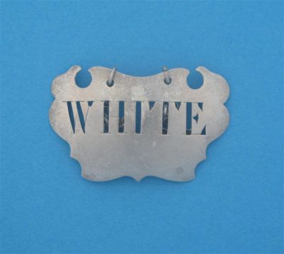 Appraisal: A George II III plain escutcheon label pierced 'WHITE' maker's