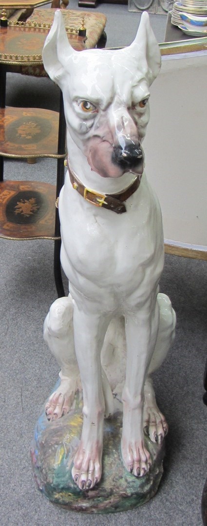 Appraisal: A pair or large pottery models of dogs late th