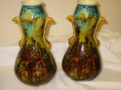 Appraisal: A PAIR OF MINTONS SECESSIONIST VASES of bulbous form with