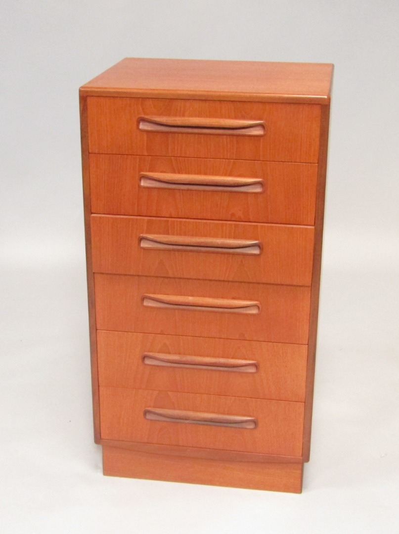 Appraisal: A G Plan teak chest of six drawers raised on