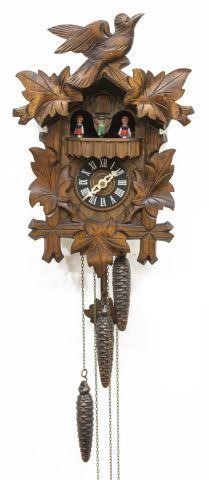 Appraisal: Vintage German carved cuckoo clock mid th c Regula featuring