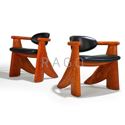 Appraisal: WENDELL CASTLE b Pair of crackle-lacquered wood and leather armchairs