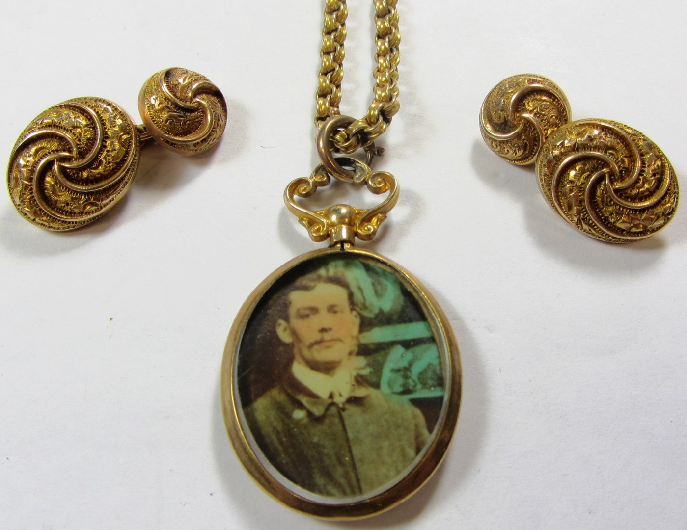 Appraisal: A ct gold mounted oval pendant locket with a gold