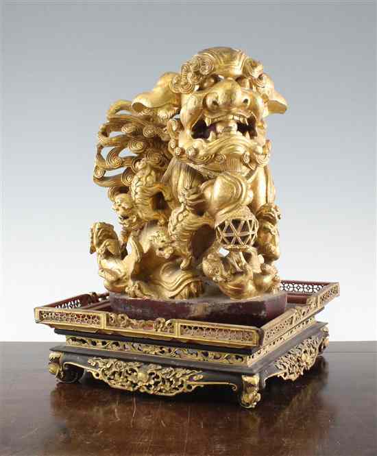 Appraisal: A Chinese lacquer and giltwood square stand late th early