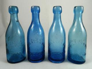 Appraisal: Soda round cobalt blue bottles Soda- round cobalt blue marked