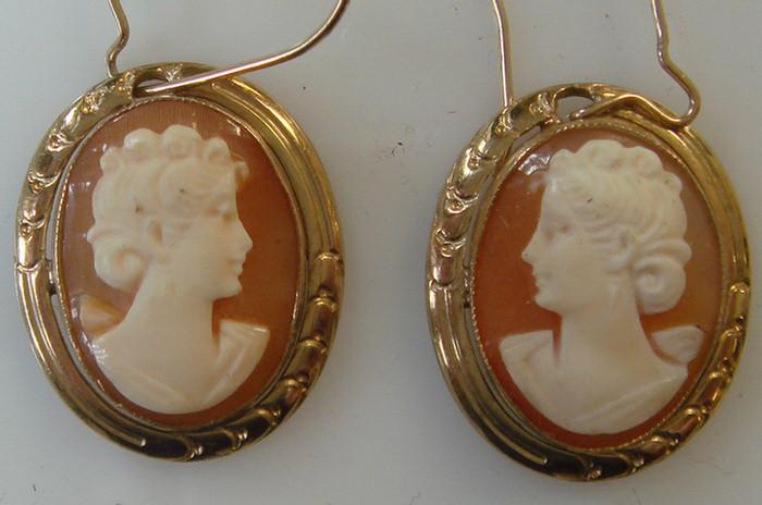 Appraisal: Pr K Cameo Earrings Yellow gold frames oval shell cameos